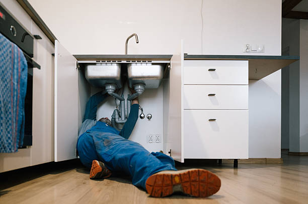 Professional Drain Cleaning technician working in Kansas, KS